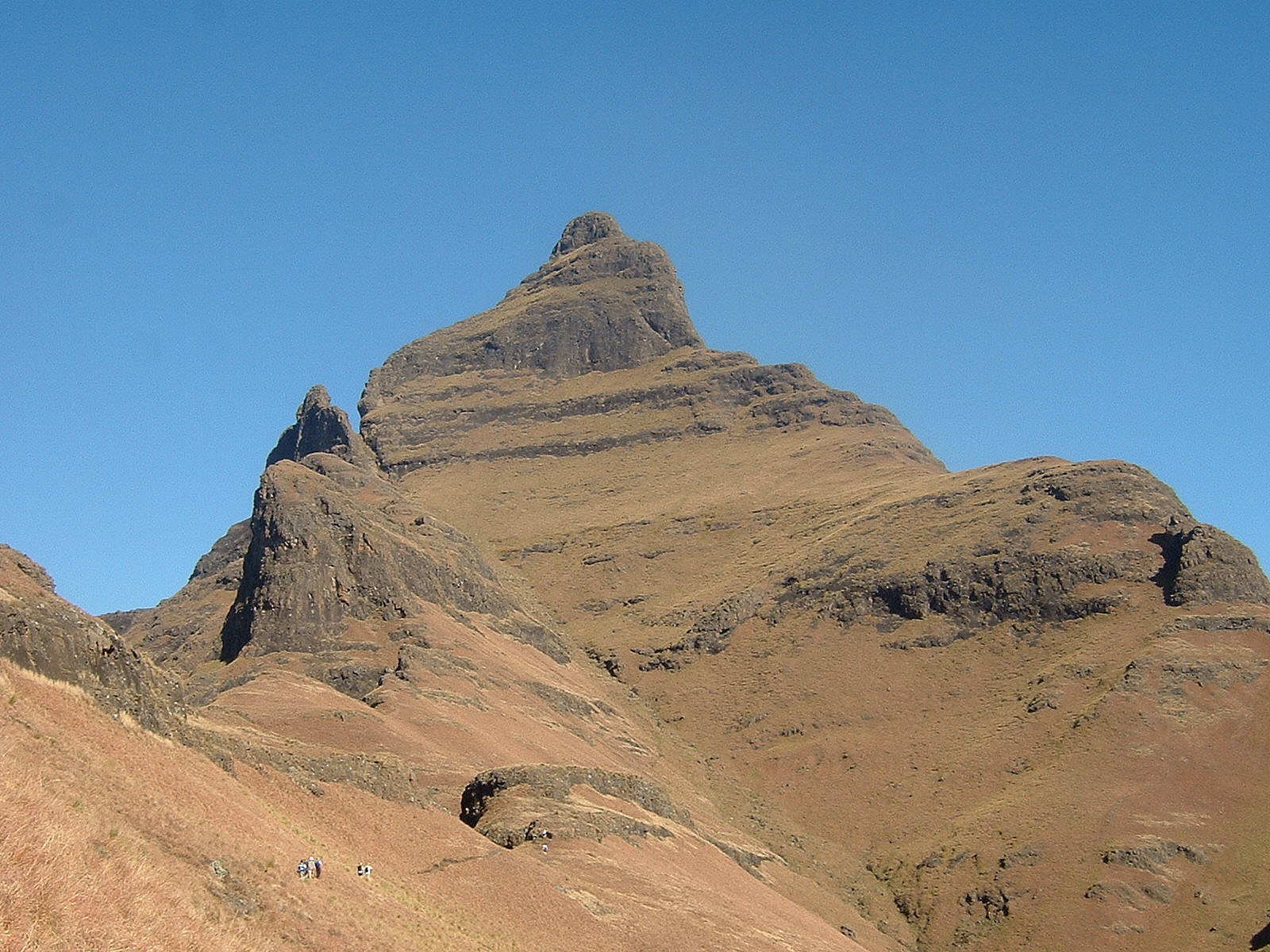 Cathedral Peak rising over the range