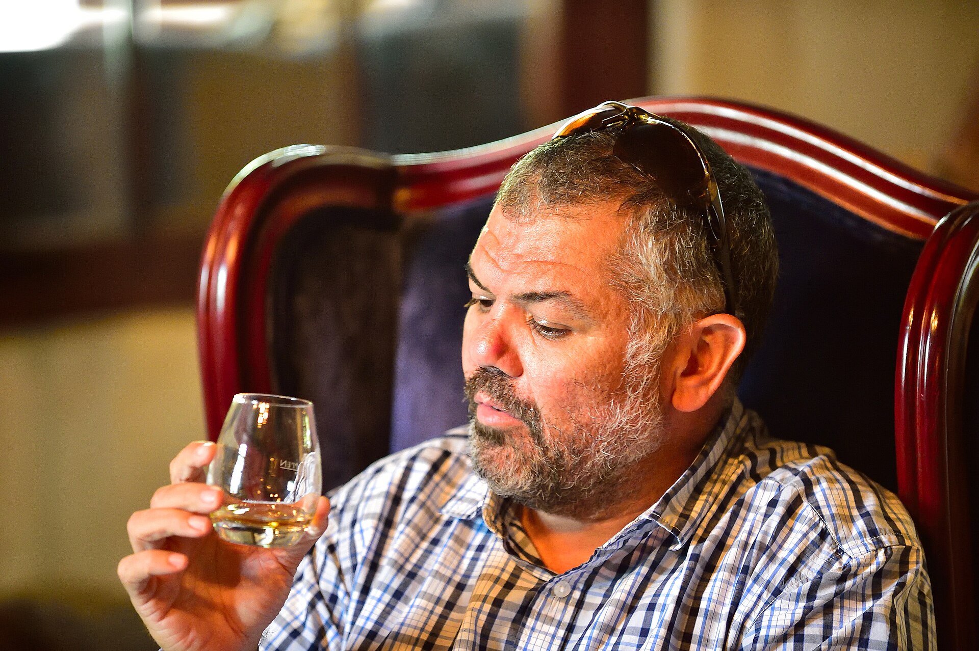 Enjoying a glass of wine at a Cape wine estate