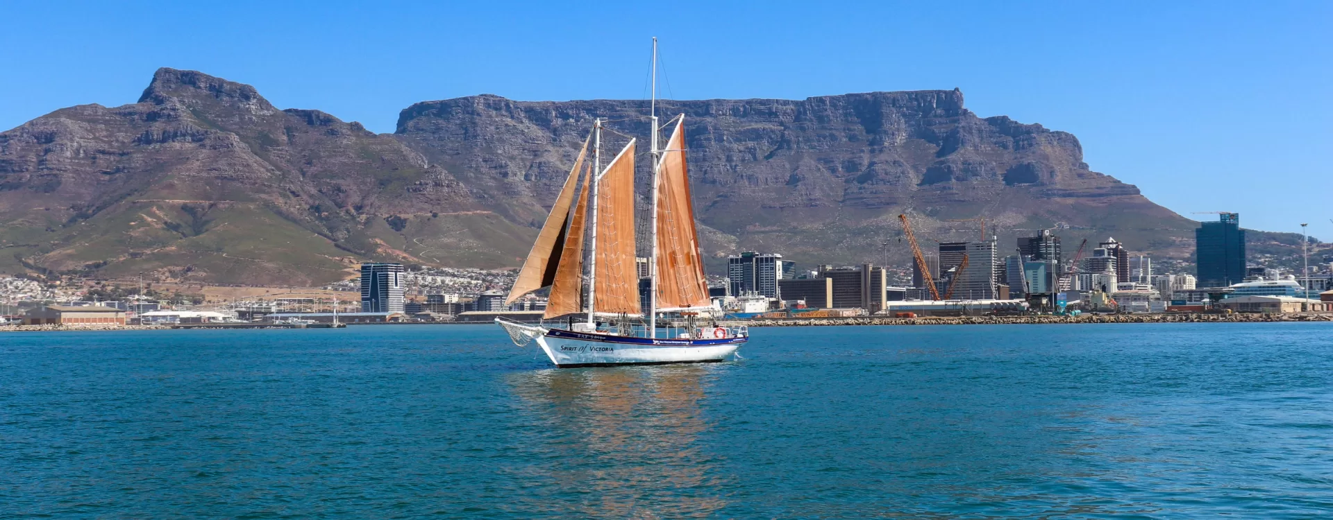 Golden-hour sail beneath Table Mountain
